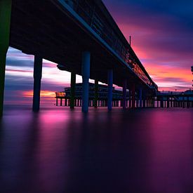 Coucher de soleil sur la jetée de Scheveningen sur Kevin Coellen