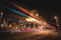 Busy intersection with light beams