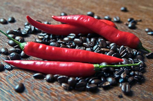 Fragrant coffee beans and fresh red chillies
