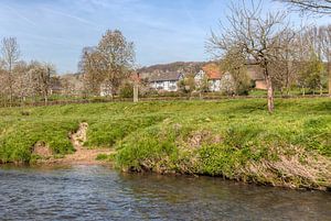 Half-timbered houses and the river Geul near Mechelen In South Limburg