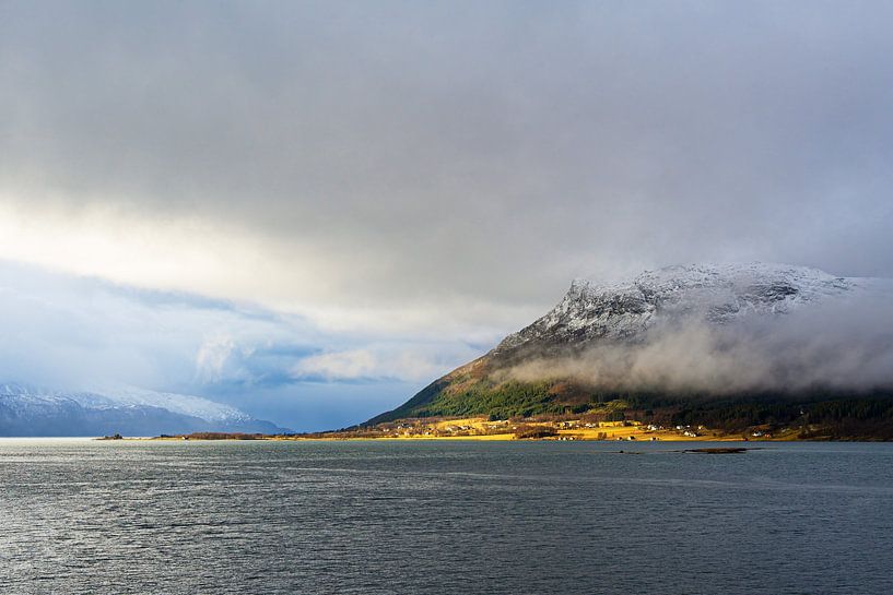 Mountains and rocks in winter near Nesna in Norway by Rico Ködder