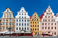 View of the beautiful colored facades of the houses in Cracow (Poland)