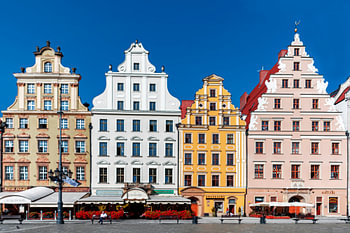 View of the beautiful colored facades of the houses in Cracow (Poland)