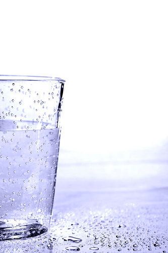 Glas met druppels water