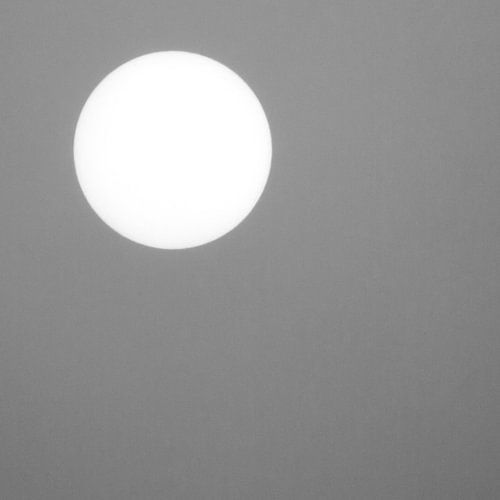 Sun against a grey background