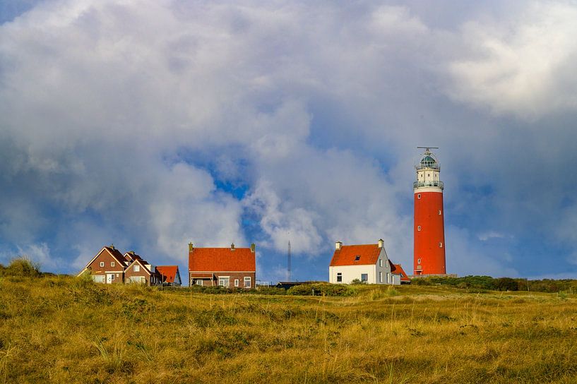 Texel lighthouse in the dunes with during a stormy autumn morning by Sjoerd van der Wal Photography