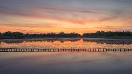 A beautiful sunset over the waters of Ae'’s Woudbloem in the province of Groningen