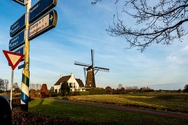 Windmolen op een kruising von Brian Morgan