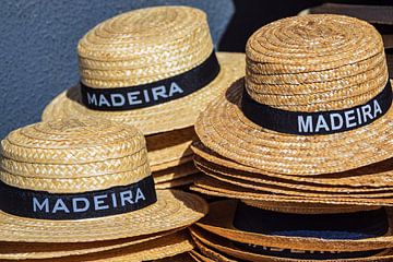 Straw hats in Funchal on the island Madeira, Portugal van Rico Ködder