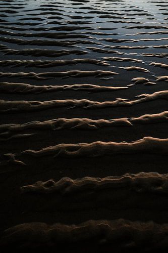 Goldenes Glühen auf dem Sand in Mimizan