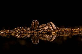 Three coffee beans in a row