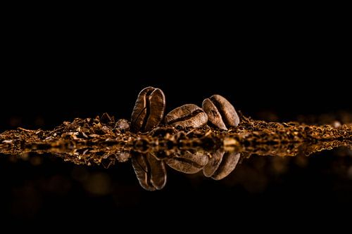 Three coffee beans in a row