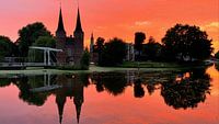 The Oostpoort in Delft with sunset