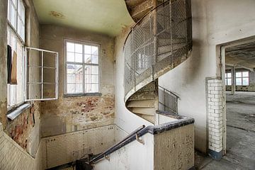 Spiral staircase of an industrial ruin, Lost Place by Jacqueline Ansorg