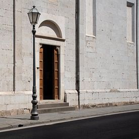 Rustieke stadsfoto van gebouw entree poort in Siena Italie