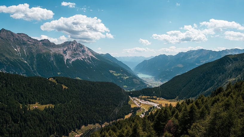 breathtaking panoramic view of Poschiavo valley and lake from Alp Grum in Swiss Alps. by Steven Van Aerschot