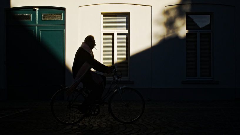 the lone cyclist by Wim Mees