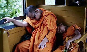 Thai monks on the train by Karel Ham