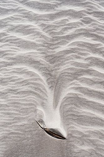 Lijnenspel in het zand