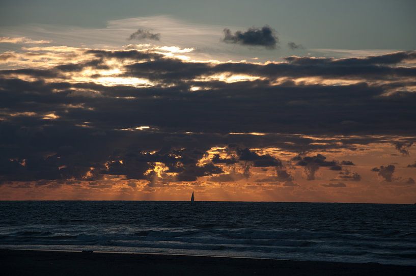 Zonsondergang aan de kust van Roel Van Cauwenberghe