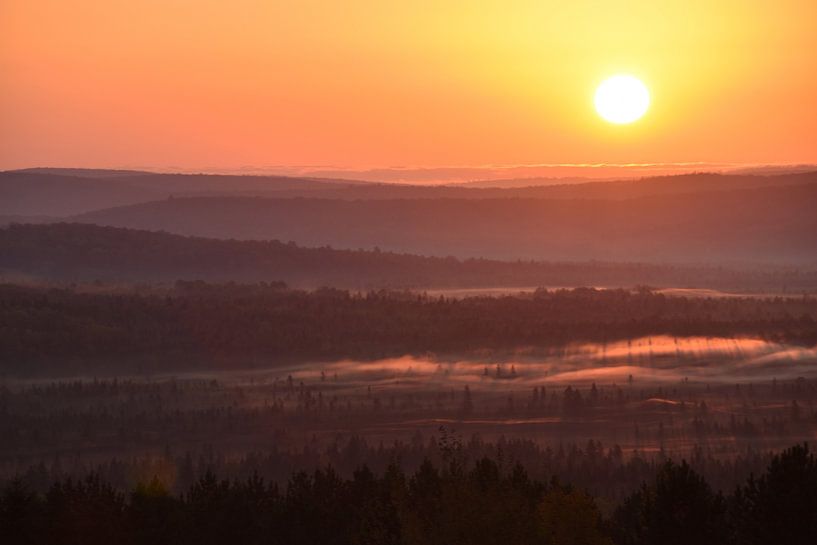 A sunrise on an autumn morning by Claude Laprise