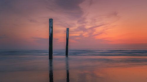 Noordzeestrand - Voor paal staan