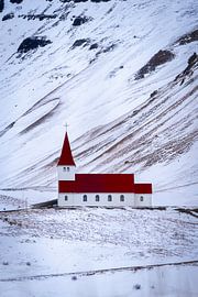 White church with a red roof in a snowy landscape, Vík, Iceland by René Wiegmink
