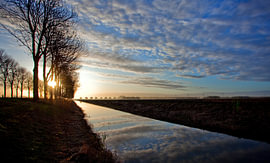 Zonsopkomst nabij Dronten sur Juul Baars