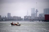 The skyline of Rotterdam on a foggy morning