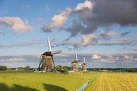 Drie molens onder prachtige wolken op het platteland van iPics Photography thumbnail