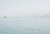 Zeilboot op Caribische zee in rustgevende blauwe tinten van Marleen Dalhuijsen thumbnail