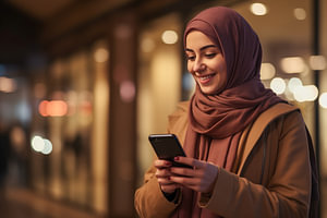 Junge Frau aus dem Nahen Osten mit Smartphone