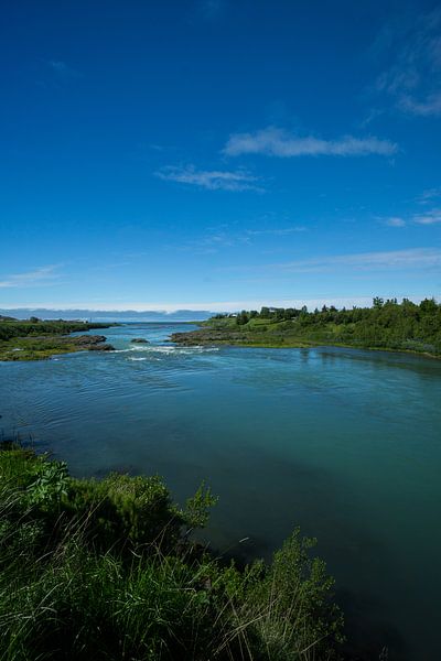 Iceland - Natural blue stream flowing into the ocean by adventure-photos