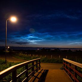 Bridge with shining night clouds Schagen by Margreet Frowijn