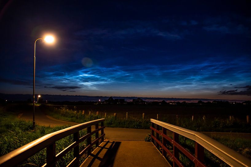 Bridge with shining night clouds Schagen by Margreet Frowijn