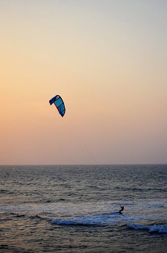 Kitesurfing in the sea of Cartagena de Indias, Colombia, during the sunset