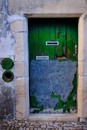 Green door with 2 letter boxes