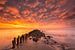 Zonsondergang boven de Waddenzee bij eb van Bas Meelker