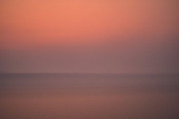 Horizontale abstracte zonsondergang over de zee