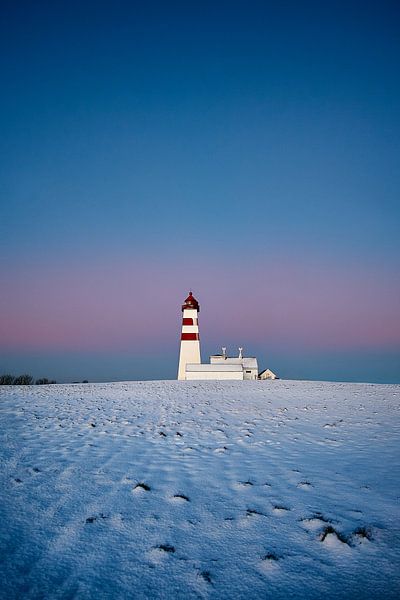Alnes lighthouse during sunset in winter, Godøy, Norway by qtx