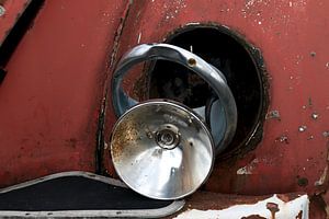 photo of a broken headlight by W J Kok