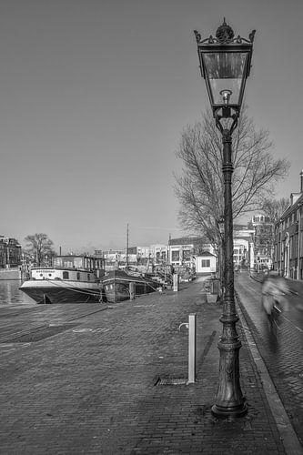 Cycling along the Amstel in Amsterdam