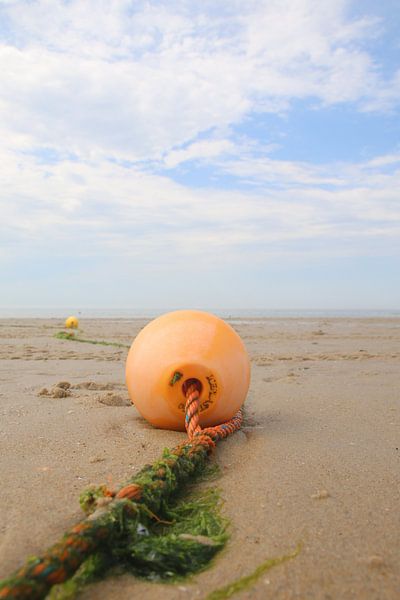 Buoy on the beach by Mattis Vollertsen