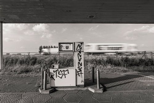 Abandoned petrol station on motorway towards Germany by Humphry Jacobs
