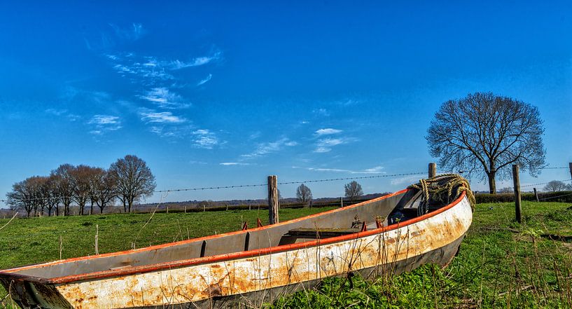 Beautiful still image of an old rowing boat at the Cuijksesteeg, Mook, North Limburg. by Jeroen Hoogakker