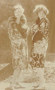 Two models show off their coats, 1923