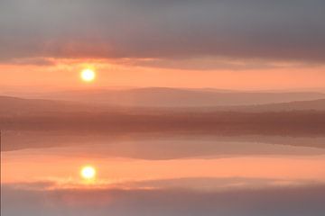 A sunrise on an autumn morning by Claude Laprise