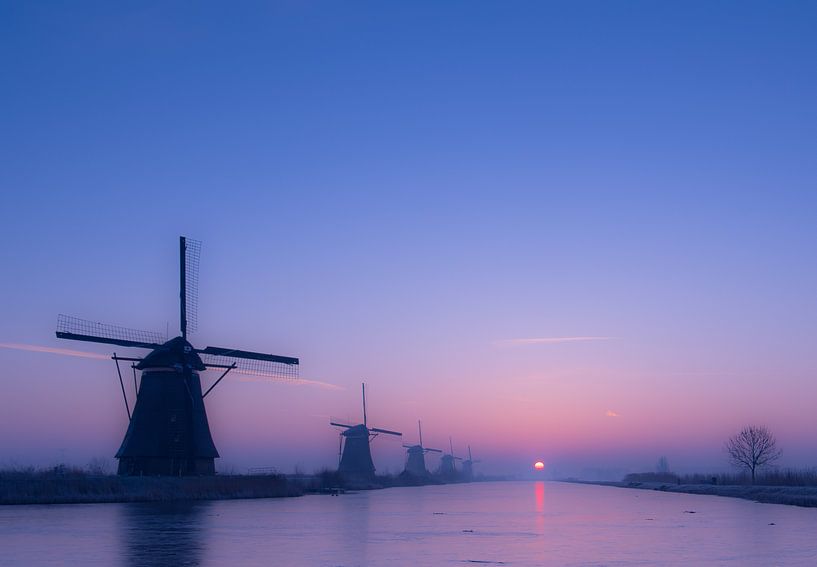 Lever du soleil dans les moulins. par Fotografie door Geert-Jan