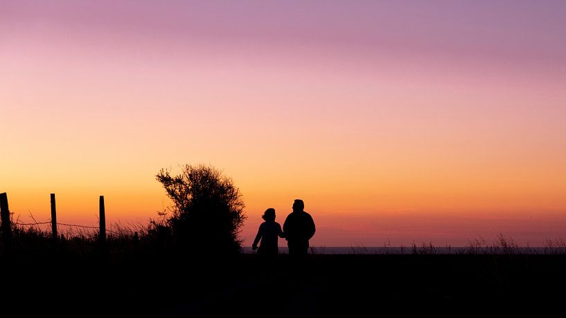Couple in sunset by Noud de Greef