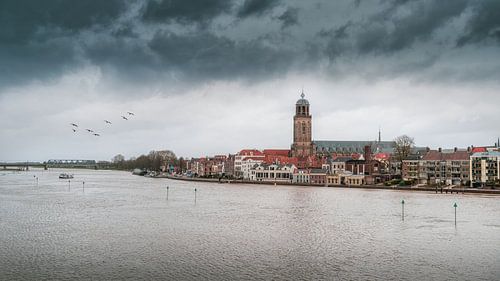Clouds over Deventer during high tide.